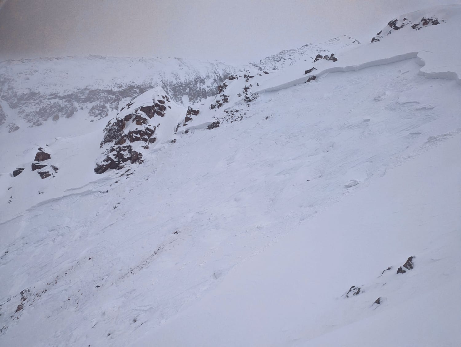 looking from the side at a wind slab avalanche crown.