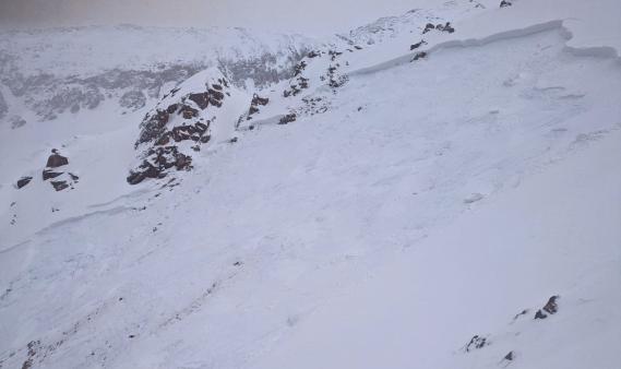 looking from the side at a wind slab avalanche crown.